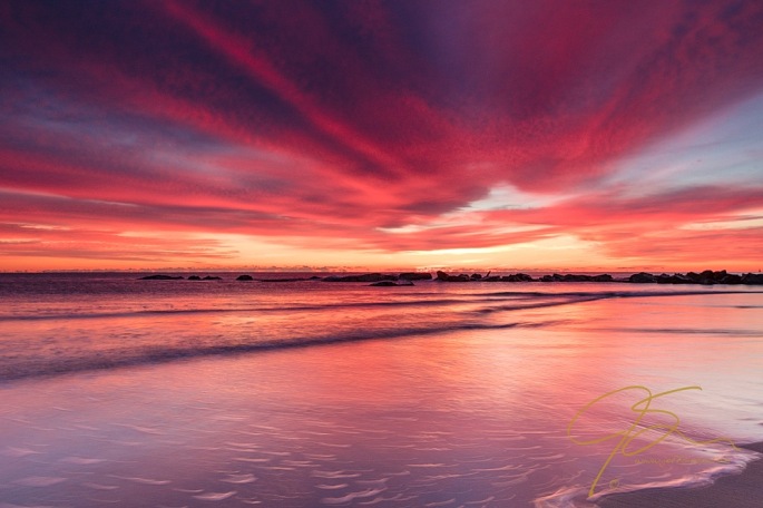 Fiery sunrise over Hampton Beach, NH